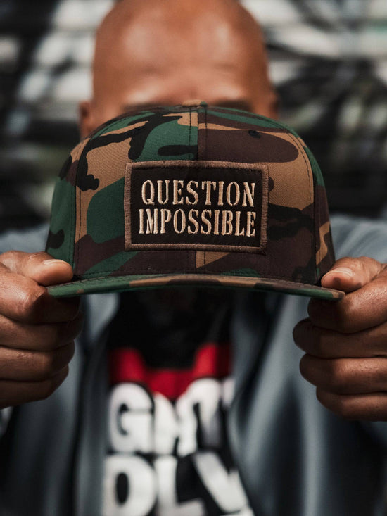 Iron Addicts Question Impossible Snapback Hat (Green Camo / Brown)